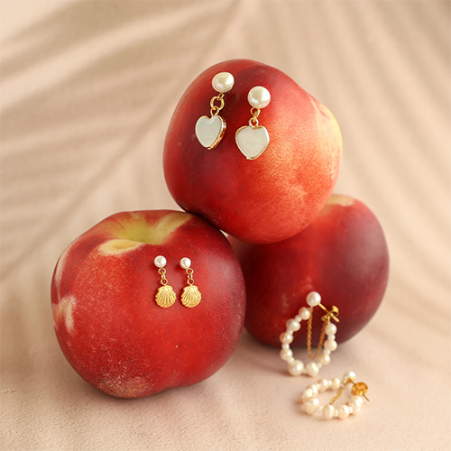 Mixa e abbina con orecchini  in acciaio inox con perle d'acqua dolce