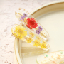 Bracciali con fiori secchi e fermagli per capelli abbinati
