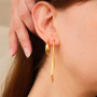 Mix & match con orecchini in acciaio inossidabile