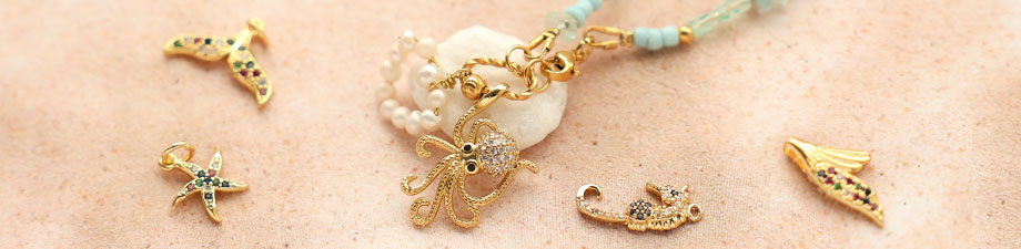 Sì! Scopri i nuovi ciondoli in metallo TQ in ottone Sì! Scopri i nuovi ciondoli in metallo TQ in ottone